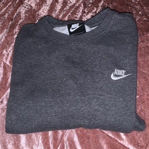 Gray Nike crewneck.